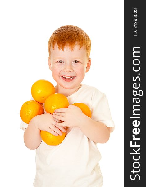 Red-haired Boy With Oranges Isolated On White