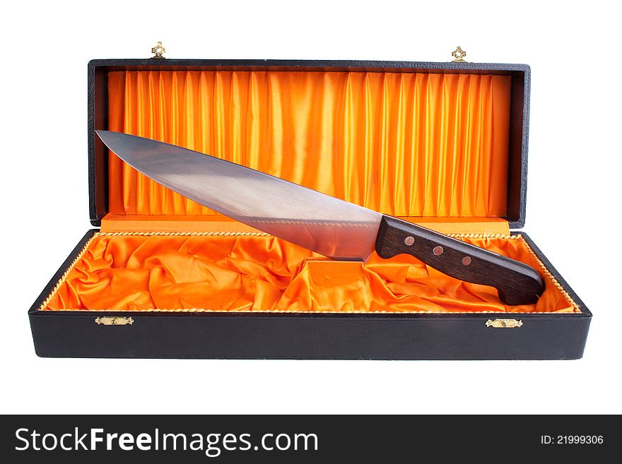 Big knife in coffin style box, isolated on white. Big knife in coffin style box, isolated on white