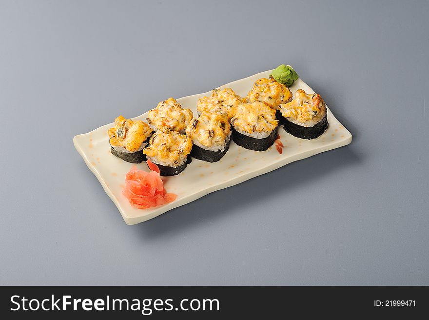 Japan maki roll with sause topping. Japan maki roll with sause topping