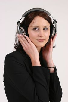 Businesswoman Listening To Her Favorite Music Stock Photography