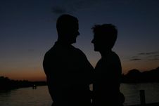 Sillhouette Of Man And Wife At Sunset Royalty Free Stock Photography