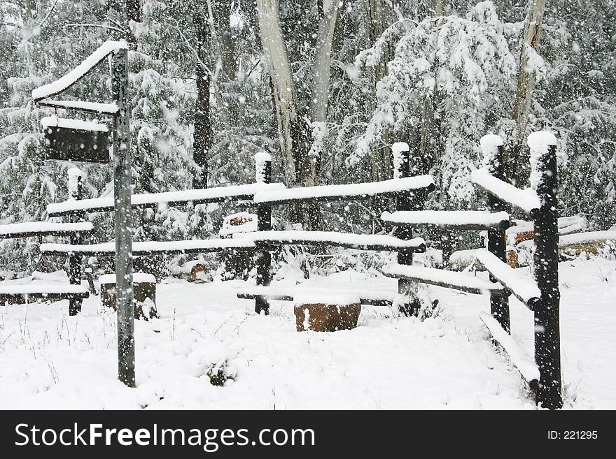 Snowlined fence during snowfall