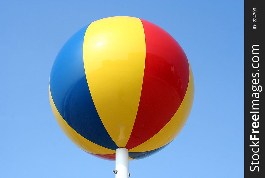 A colorful ball on a pole