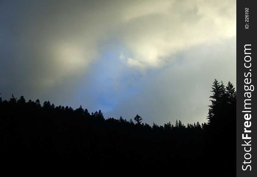 Blue Sky with grey clouds in mountains. Blue Sky with grey clouds in mountains