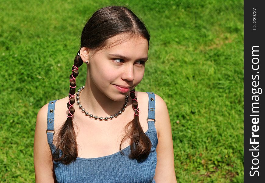 Teenage girl on grass