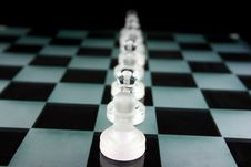 Chess Pieces On A Glass Board Stock Photo Chess Pieces On A Glass Board Stock Photo
