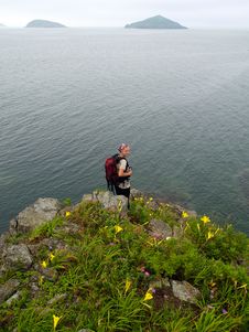 Hiking Girl On The Ocean Rock Stock Photos Hiking Girl On The Ocean Rock Stock Photos