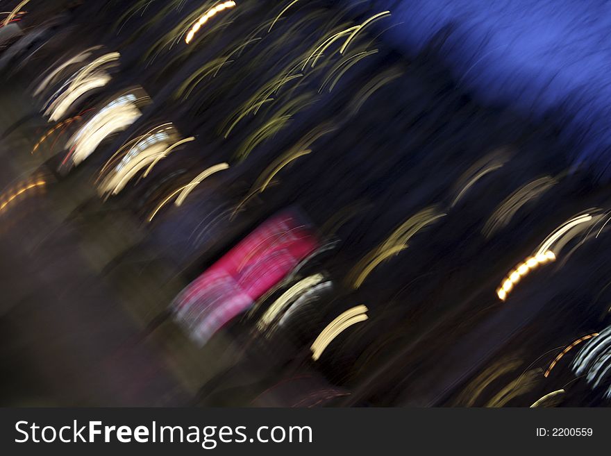 In Paris the Champs Elysees and cars in a blur. In Paris the Champs Elysees and cars in a blur