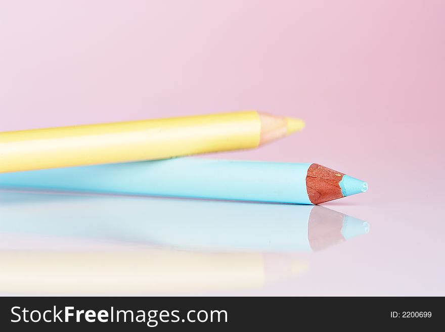 Two Eye Pencils with reflection