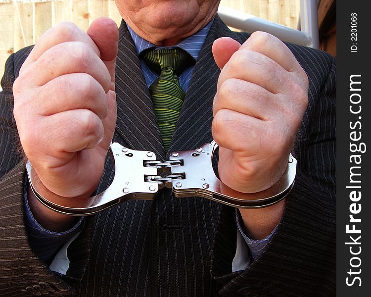 Businessman caught with his hands in the till.