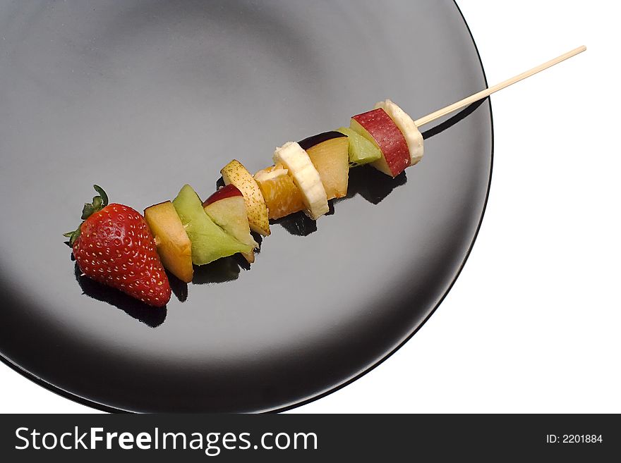 Fruit pieces on a spike, healthy eating. Fruit pieces on a spike, healthy eating