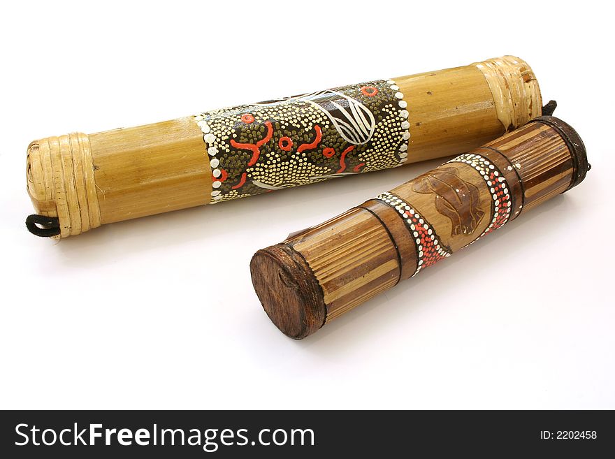 Two maracases, small and big one, made of bamboo. With ethnic pattern.