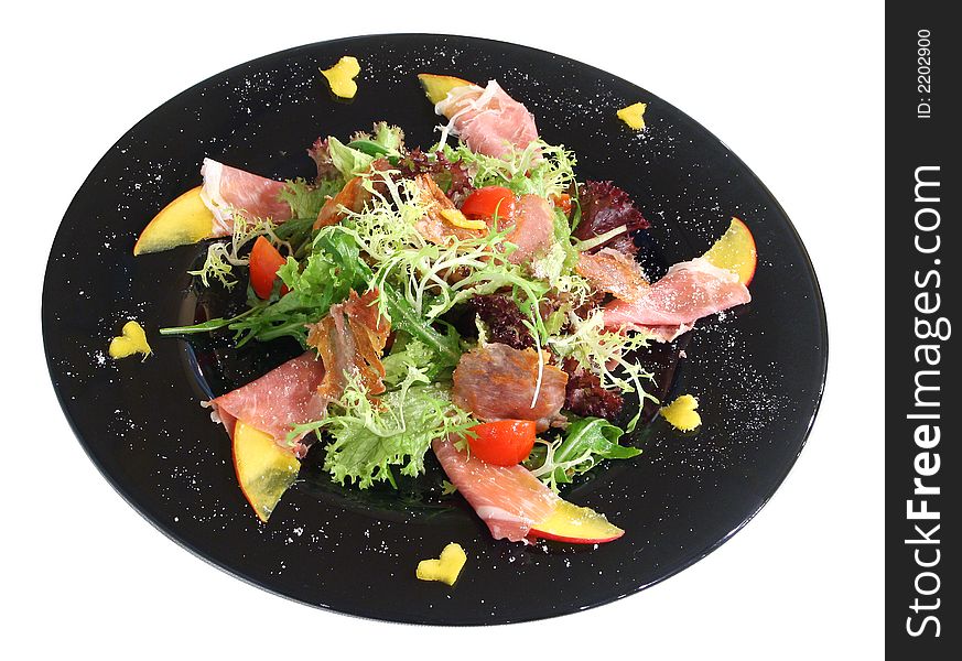 Salad with Parma ham, rukkola, kiwi and green
