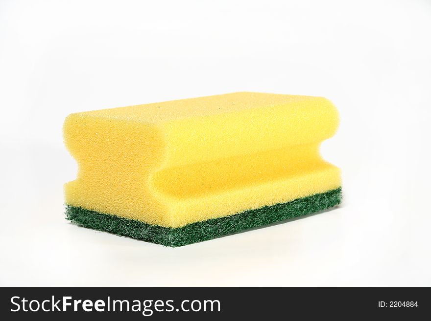 A yellow scourer isolated on a white background.