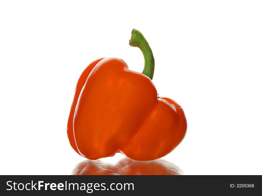 The big sweet orange pepper on a white background. The big sweet orange pepper on a white background