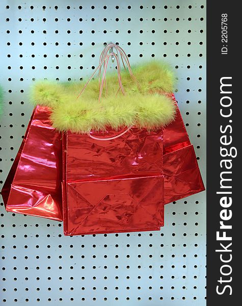 Three red gift bag on blue background. Three red gift bag on blue background