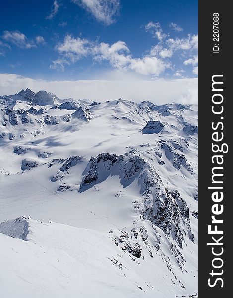 Breathtaking Snowy mountains landscape with blue skies. Breathtaking Snowy mountains landscape with blue skies