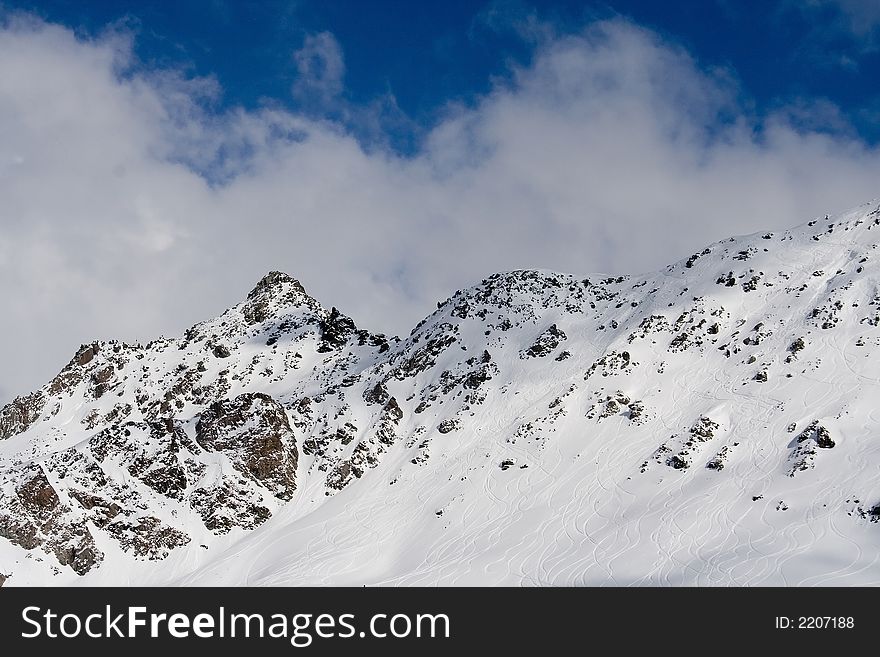 Breathtaking Snowy mountains landscape with blue skies. Breathtaking Snowy mountains landscape with blue skies