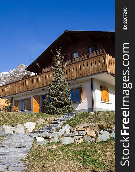 Beautiful Swiss chalet on a mountain. Beautiful Swiss chalet on a mountain