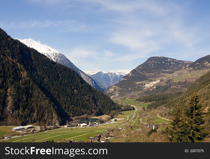 Breathtaking Snowy mountains landscape with a view on the valley. Breathtaking Snowy mountains landscape with a view on the valley