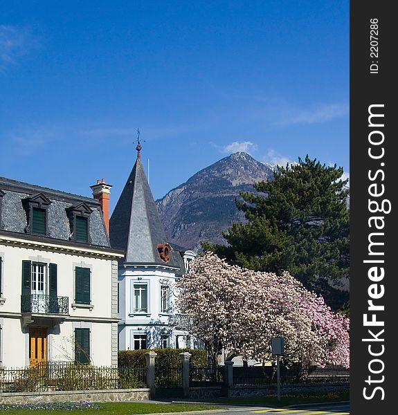 Beautiful Swiss chalet near a mountain. Beautiful Swiss chalet near a mountain