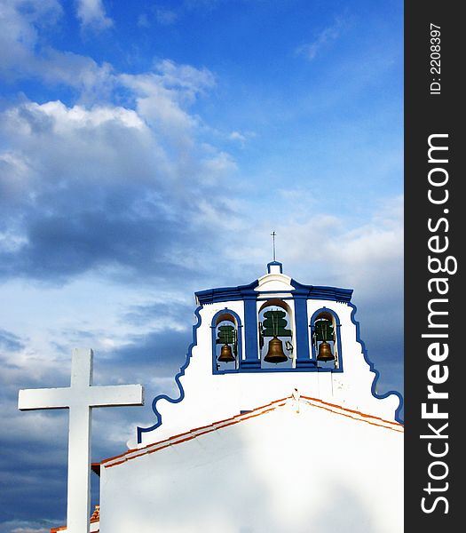 Church And Cross against the Blue Sky