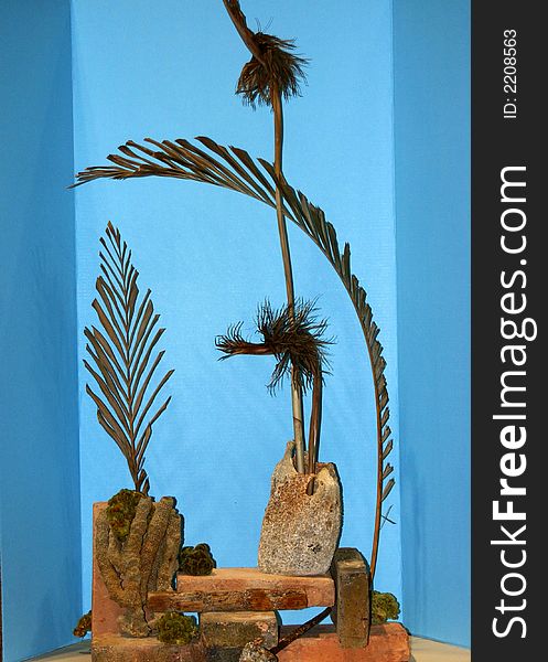 Palm branches in stone vases for interior design
