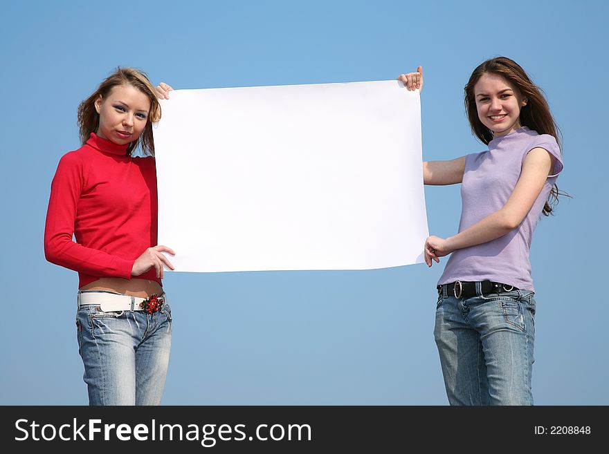 Girls with blank card for text. Girls with blank card for text