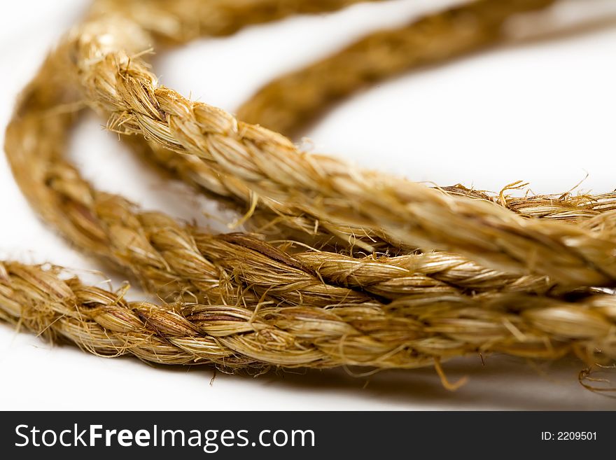 Close-up shot of a rope. Isolated white background