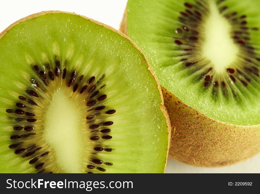 Kiwi Sliced in half and isolated on white. Kiwi Sliced in half and isolated on white