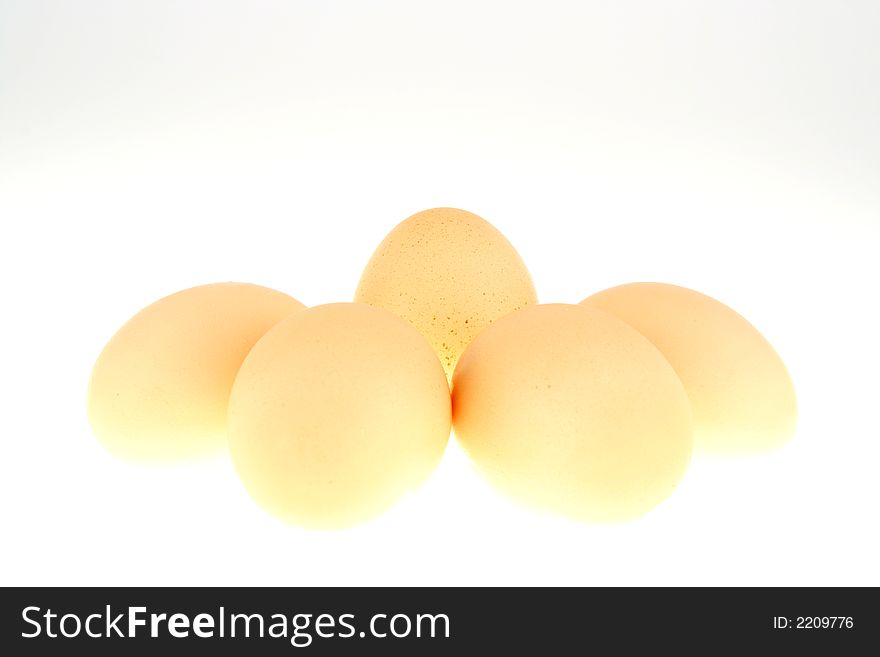 Shining egg on white background