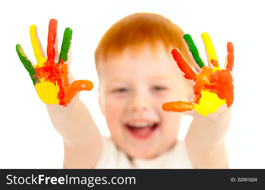 Red-haired Boy With Focused Painted Hands