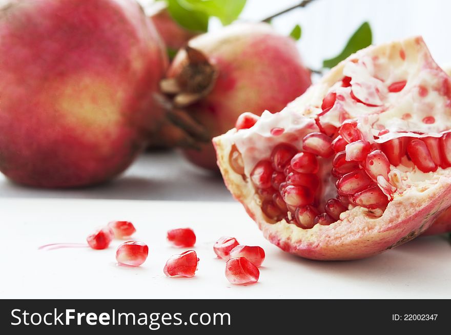 Red ripe pomegranates, hole and half