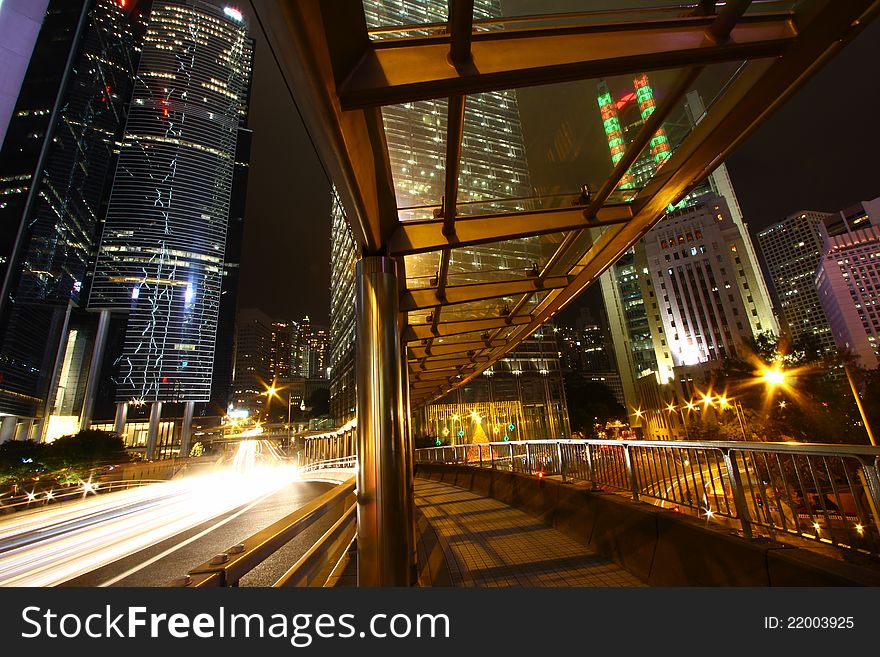 A view of the lights and skyscrapers in downtown Hong Kong at night