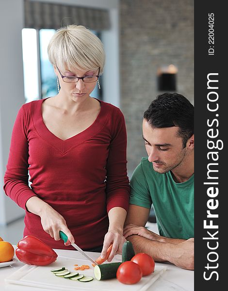 Young Couple Have Fun In Modern Kitchen