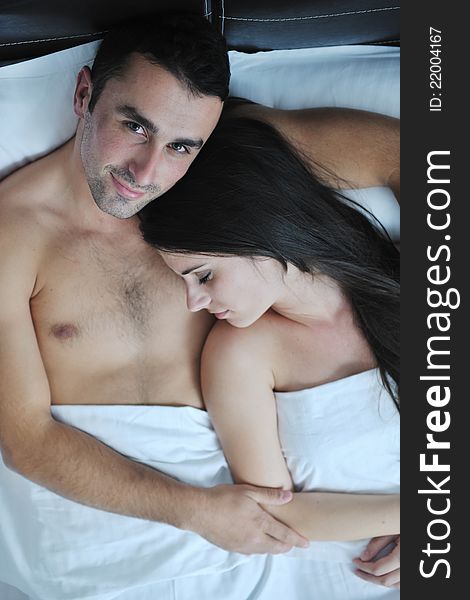 Young Couple Have Good Time In Their Bedroom