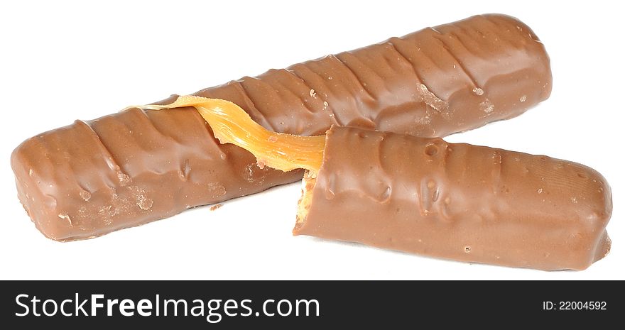 Chocolate bars with viscid caramel on a white background. Chocolate bars with viscid caramel on a white background