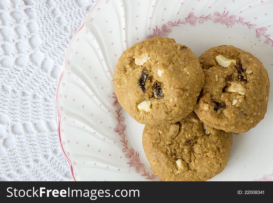 Three of cookies on sweet plate top view. Three of cookies on sweet plate top view