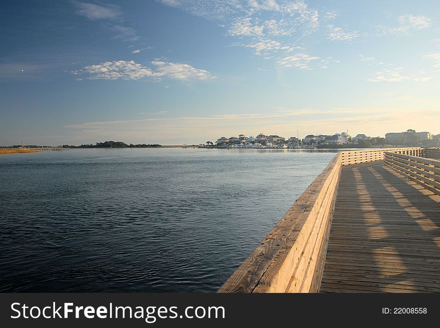 Sun over the ocean in North Carolina as seen from the boardwalk to the beach.