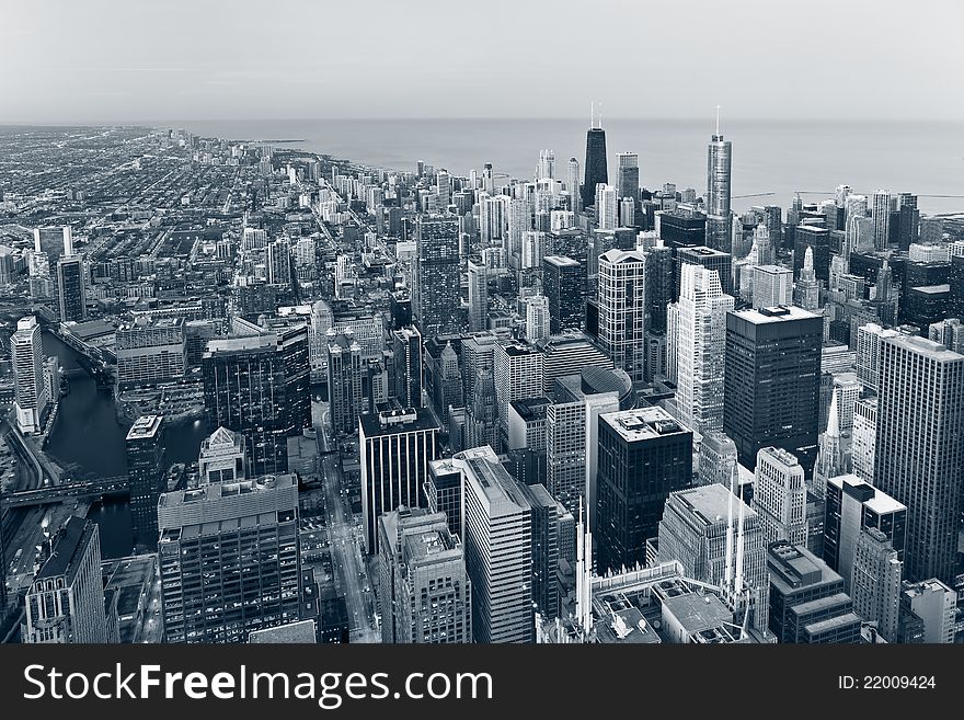 Aerial view of Chicago downtown at twilight from high above. Aerial view of Chicago downtown at twilight from high above.