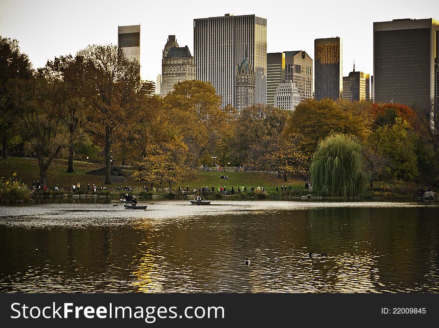 Central Park's Great Pond is enjoyed by walkers and boat rowers amid fall colors. Central Park's Great Pond is enjoyed by walkers and boat rowers amid fall colors.