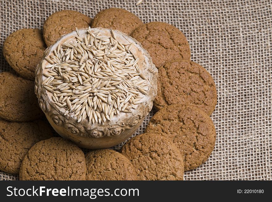 Oatmeal cookies with grains over sacking