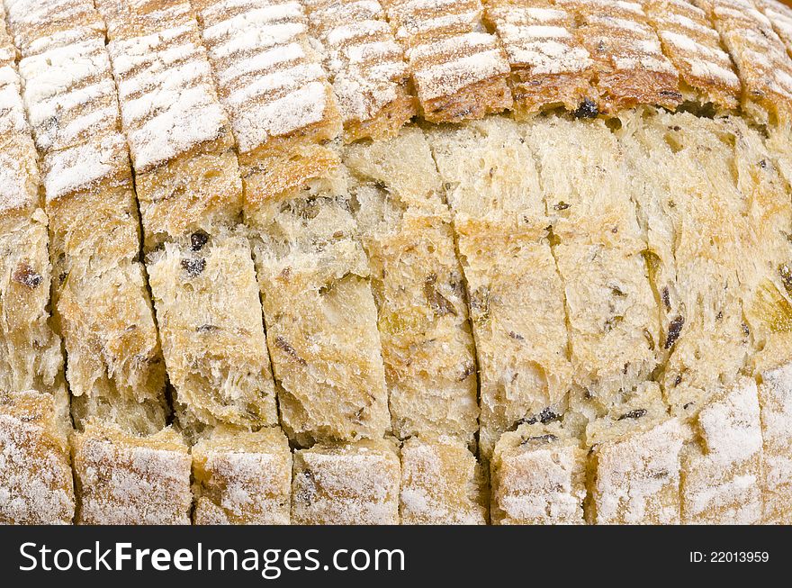 Close up of a loaf of olive and herb bread. Close up of a loaf of olive and herb bread.