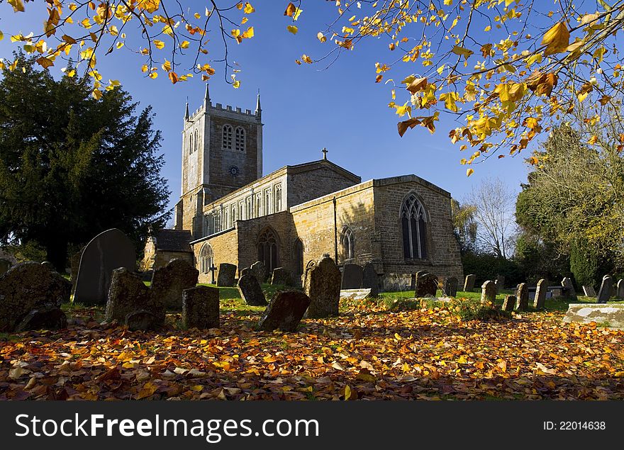 Autumn Leaves in The Old Church and Graveyard at Badby, Northamptonshire, England. Autumn Leaves in The Old Church and Graveyard at Badby, Northamptonshire, England