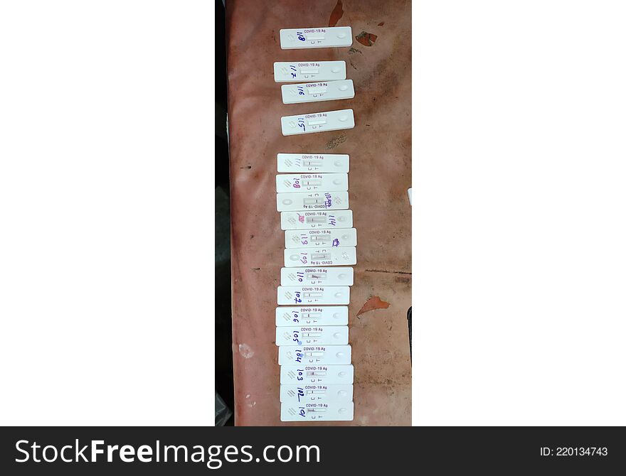 Corona virus Covid19 rapid antigen testing kit under observation after swab collection and test on the table numbered arranged..