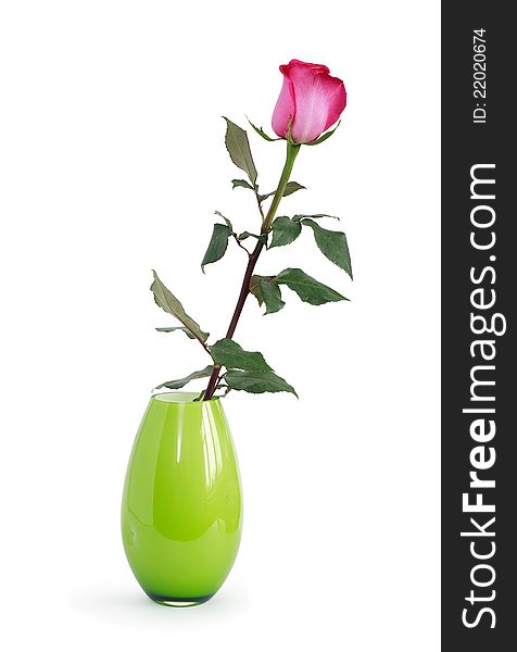 Red rose with leaves in nice green glass vase. Isolated on white with clipping path. Red rose with leaves in nice green glass vase. Isolated on white with clipping path
