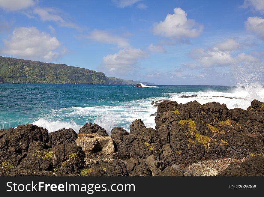 Beautiful rocky shore with blue water in Hawaii