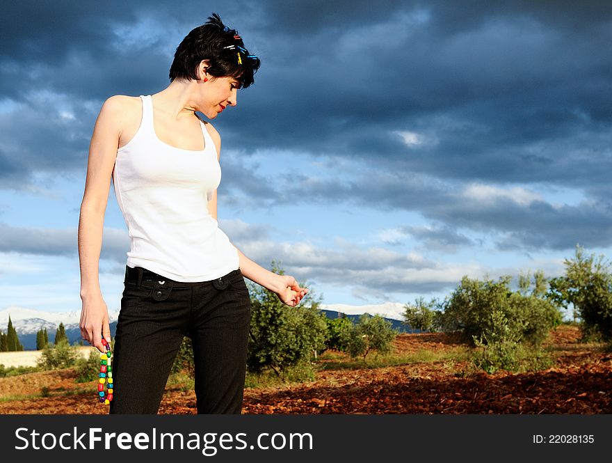 Woman Wearing A White T Shirt In The Field