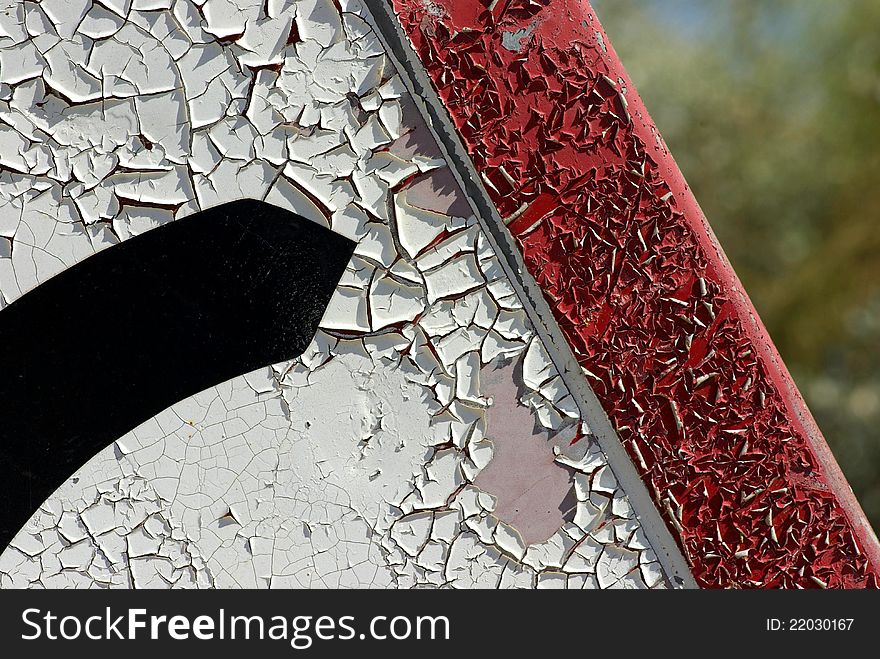 Detail of a decrepit traffic sign. Detail of a decrepit traffic sign