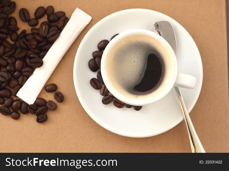 Cup of coffee on a beige background